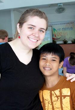 Katie Johnson, right, a May graduate from Leitchfield, Ky., made friends with Aldrin in the Philippines.